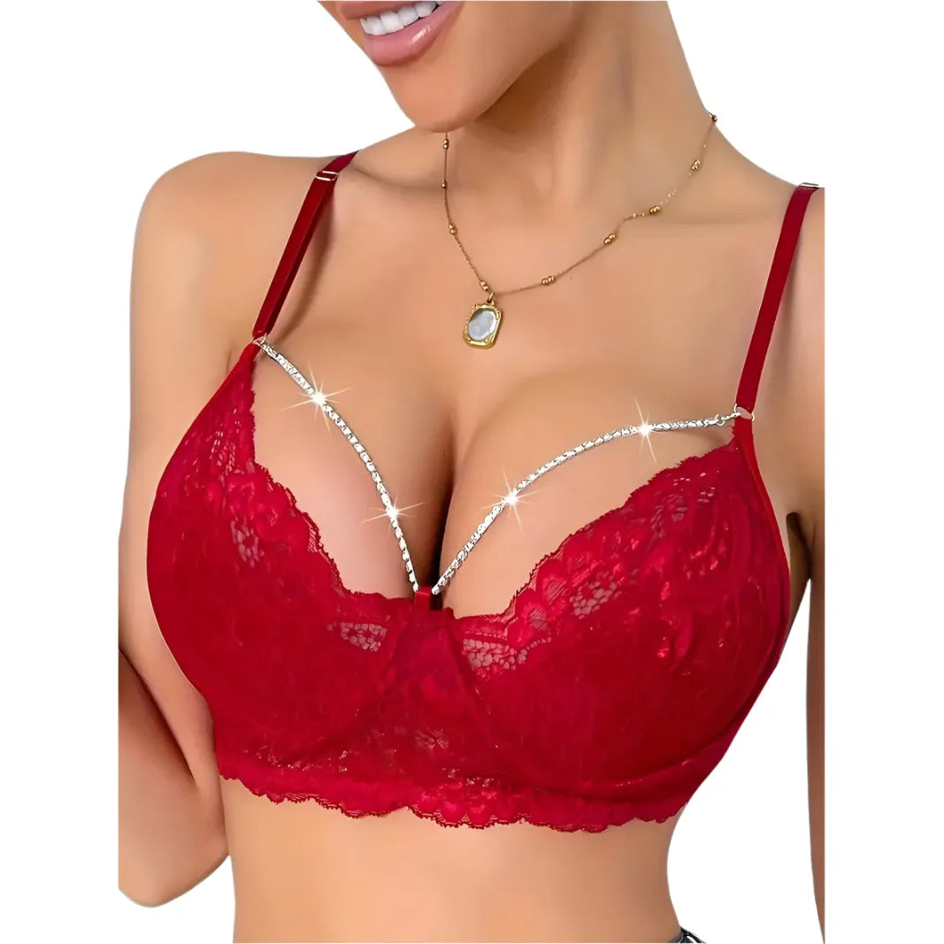 Red lace bra with rhinestone chain draping across cups and straps.